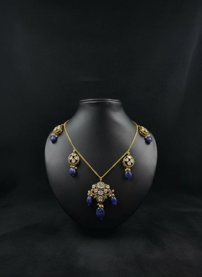 Hasli necklace with polki work and blue gemstone