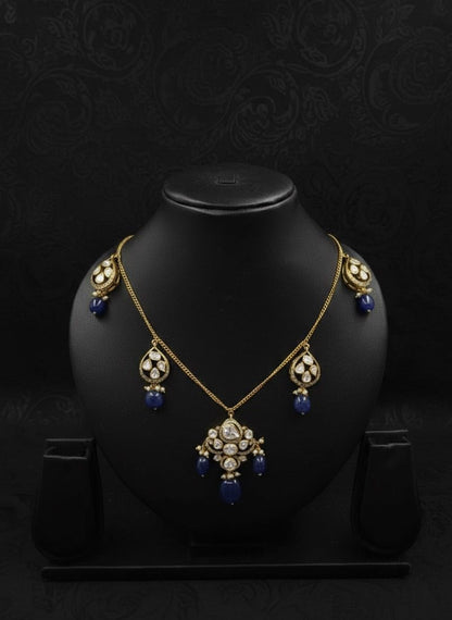 Hasli necklace with polki work and blue gemstone