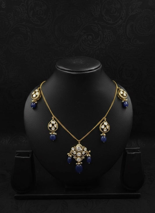 Hasli necklace with polki work and blue gemstone