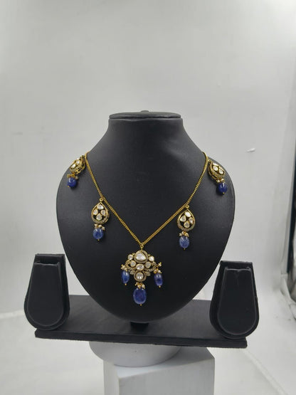 Hasli necklace with polki work and blue gemstone